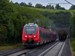 Es regnet ohne unterbrechung am 31.08.2012 als RE9 Hamsterbacken-Doppel 442 763 und 442 261 auf der KBS 480 bei Eilendorf nach Aachen fahren