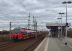 Nachschuß auf einen RSX der an der S-Bahnhaltestelle vorbei fährt.