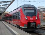 442 339-8 als RB 12(RB 13265)von Rostock Hbf nach Ribnitz-Damgarten West im Rostocker Hbf.fr den Fotografen gab es dann noch Fernlicht.08.08.2014