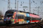 442 854-6 als S1 von Warnemnde nach Rostock Hbf bei der Ausfahrt im Bahnhof Warnemnde 18.04.2015