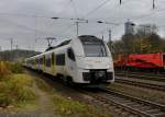 460 015 von der Mittelrheinbahn am 24.11.2012 bei der Ausfahrt in Kln West.