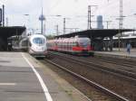 Ein 403 und ein 644 der als RB 24 nach Kall bereitgestellt wurde treffen sich am 27.06.2007 in Kln Messe/Deutz.