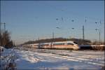 403 001  Freiburg im Breisgau  legt sich um 09:56 Uhr am Morgen des 06.01.2009 in Ehrenfeld in die Kurve. Vermutlich handelt es sich um den ICE 614 nach Dortmund Hbf....
