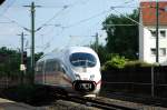 ICE von Mnchen Hbf am 23.05.2010 bei der Durchfahrt durch den Bahnhof Nrnberg-Gleihammer.