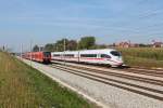 Parallelfahrt mit einem ICE 3 und 440 029 bei Hattenhofen.