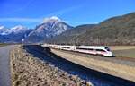 411 058  Falkenberg/Elster  als ICE 1202  Arlberg  (Bludenz - München Hbf) am 27.12.2025 bei Flaurling vor der Hohen Munde.