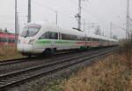 411 001-1 als ICE 1630 von Warnemünde nach Frankfurt(Main)Hbf bei der Ausfahrt im Rostocker Hbf.07.01.2023