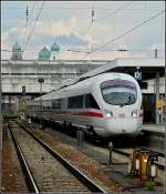 Der ICE-T 411 560-7  Tutzing  verlsst am 10.09.2010 den Bahnhof von Passau vor der Kulisse der Trme des Stephansdoms.