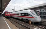 411 013 ( Hansestadt Stralsund ) als ICE928 in Nrnberg Hbf, 4.9.010. Links neben 411 013 wartet 143 318.