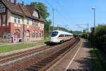 411 009-4  Gstrow  mit dem 1607 Hamburg Altona nach Mnchen Hbf bei der Durchfahrt im Hp Zeutsch.25.07.2012