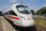 Hier 411 071-4  Oschatz  als ICE1617 von Warnemünde nach München Hbf., dieser Triebzug stand am 26.7.2015 in Warnemünde.