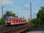 420 884-9 als S9 nach Wiesbaden Hbf zwischen Mainz-Bischofsheim und dem Abzw.Kostheim.