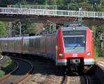 423 031/531, 030/530 u. 311/811 als S1 nach Herrenberg hier bei der Einfahrt von Esslingen-Zell. 30.09.07