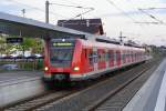 Am 13.06.09 steht 423 424 als S-Bahn-Linie S2 (Dietzenbach-Niedernhausen/Taunus) in Heusenstamm abfahrbereit.