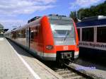 423 958-8 in Verbund mit 433 958-6, 433 458-7 und 423 458-9 als S8 nach Mnchen Flughafen in Geltendorf(20.07.2009).