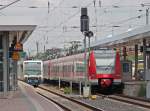 Ein Regiosprinter der Rurtalbahn und 423 551-1 als S12 nach Au(Sieg) in Dren Hbf, 13.6.10