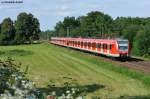 423 849-9 mit einer S1 von Freising/Flughafen nach Ostbahnhof bei Feldmoching, 10.08.2011 