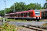 Ein ET 423 in Dreieich Buchschlag Bahnhof am 03.06.2011.