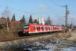 423 281 als S1 zum Ostbahnhof am 26.01.2012 bei Mnchen-Feldmoching.