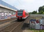 Triebzug 423 040 als S11 Fahrtrichtung D-Flughafen / Terminal konnte am 16.7.13 bei der Einfahrt in K-Buchforst fotografiert werden.