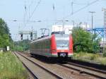 Nachschuss auf 423 955-4 der S-Bahn Rhein Main auf den Weg nach Köln.