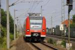 424 516-3 ereicht am 07.08.10 Ahlten. Fotografiert von Bahsteinsteig aus.