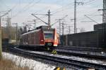 424 022 in Richtung Hannover, verlsst Lehrte, am 15.01.2012.