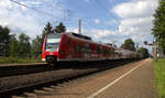 Die Rhein Niers Bahn (RB33) kommt die Kohlscheider-Rampe hoch aus Duisburg-Hbf/Heinsberg-Rheinland) nach Aachen-Hbf und hält in Kohlscheid und fährt in Richtung Richterich,Laurensberg,Aachen-West,Aachen-Schanz,Aachen-Hbf. 
Aufgenommen von Bahnsteig  1 in Kohlscheid.
Bei Sonnenschein und Wolken am Nachmittag vom 25.6.2018.