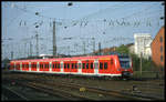 425012 fährt hier am 23.4.2001 um 18.10 Uhr in Münster in Westfalen in Richtung Ruhrgebiet ab.