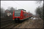 DB 425062-7 erreicht hier aus Osnabrück kommend am 29.1.2005 den Haltepunkt Hiddenhausen Schweicheln.