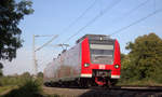 Die Rhein Niers Bahn (RB33) kommt aus Duisburg-Hbf,Heinsberg(Rheinland) nach Aachen-Hbf und kommt aus Rheydt,Wickrath,Beckrath,Herrath,Erkelenz,Baal,Hückelhoven-Baal,Brachelen,,Lindern,Süggerath,Geilenkirchen und fährt durch Frelenberg in Richtung Zweibrüggen,Übach-Palenberg,Rimburg,Finkenrath,Hofstadt,Herzogenrath,Kohlscheid,Richterich,Laurensberg,Aachen-West,Aachen-Schanz,Aachen-Hbf.
Aufgenommen von einem Feldweg Zwischen Geilenkirchen und Frelenberg.
Bei Sommerwetter am 15.9.2019.