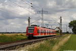 Hier zu sehen ist 425 522, wie er bei mäßigem Wetter als RB 33 nach Aachen durch Herrath fährt.