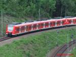 Ein ET 425 Vollzug, der auf der Gubahn in Richtung Rottweil/ Freudenstadt unterwegs ist, kommt in sterfeld aus dem Stuttgarter Talkessel. (03.06.2008)
