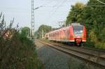 425 561 als RB33 nach Duisburg bei der ehem. Anrufschrane Trips. Dieser Zug trgt schon komplett die neue Regio DB ausfschrift 19.September.08