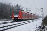 425 544 und 426 020 als RB 30056 am 20.01.2009 in Haar (bei Mnchen).