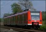 425 077 als  Rhein-Niers-Bahn  RB11072 nach Duisburg Hbf am B km 28.2 19.4.2009