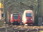 Thalys 4304 und 425 554 am 14.10.09 auf der Hohenzollernbrcke in Kln (Bild:Matthias Schneider Bearbeitung:DneMarc)