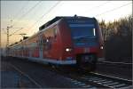 Quitschologie: Einfacher Mittelhessenexpress mit 425 016-3 (Fotostandort ist ein ffentlicher Parkplatz, Dezember 2009).