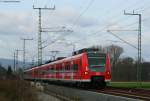 425 765-5 und 611-1 als RB 18327 (Heidelberg Hbf-Bad Friedrichshall-Jagstfeld) bei Meckesheim 12.12.09