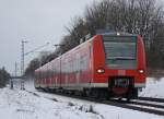 425 575 als RB33  Rhein-Niers-Bahn  aus Duisburg nach Aachen zwischen Geilenkirchen und bach am Km 25.6 31.1.2010