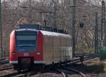 425 078-3 als RB11072 nach Duisburg bei der Ausfahrt in Viersen 6.4.10