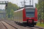 425 536-0 als RB11071 nach Aachen bei der Ausfahrt in Geilenkirchen, 16.5.10