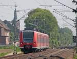 425 077 als RB11063 aus Dusiburg nach Aachen Hbf am Km 29.0 bei Geilenkirchen, 22.5.10