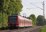 425 069/569 als RB11076 nach Duisburg am Km 26.0, 22.5.10