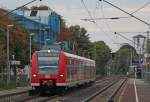 425 069-2 als RB11059 von Duisburg nach Aachen Hbf bei der Ausfahrt in Geilenkirchen, 3.10.10