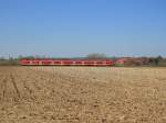 Ein Unbekannter Haard-Bahn-425 ist als RB42  Haard-Bahn  auf dem Weg von Essen nach Mnster.
Dabei fhrt er auch ber den Abschnitt Nottuln-Appelhlsen - Bsensell.
Im Hintergrund die Baumberge.
Nottuln-Appelhlsen, 27.03.211