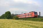 Der 425 038 fuhr am 07.06.2011 durch Kohlscheid.