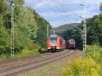 425 204/704 ist als S1 Osterburken - Homburg (Saar) zusammen mit 425 135/635 als RE 60 Trier - Kaiserslautern am 20.09.2011 bei Landstuhl