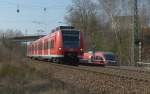 One and a half Train, Am 21.03.2012 haben 425 203/703 (Neustadt Weinsrae) und 643 028 (Katzweiler)nur zur hlfte zu sehen Paralleleinfahrt nach Kaiseslautern hier in Kaiserslautern Pfaffwerk    