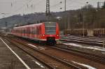 Der 425 712-7 als S1 nach Osterburken verlsst er den Bahnhof Neckarelz.